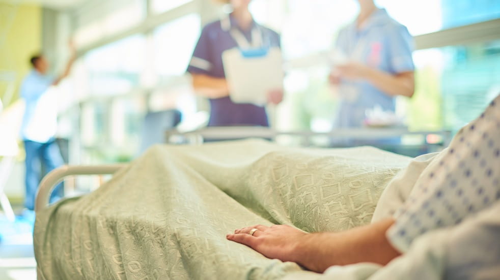 patient in hospital bed